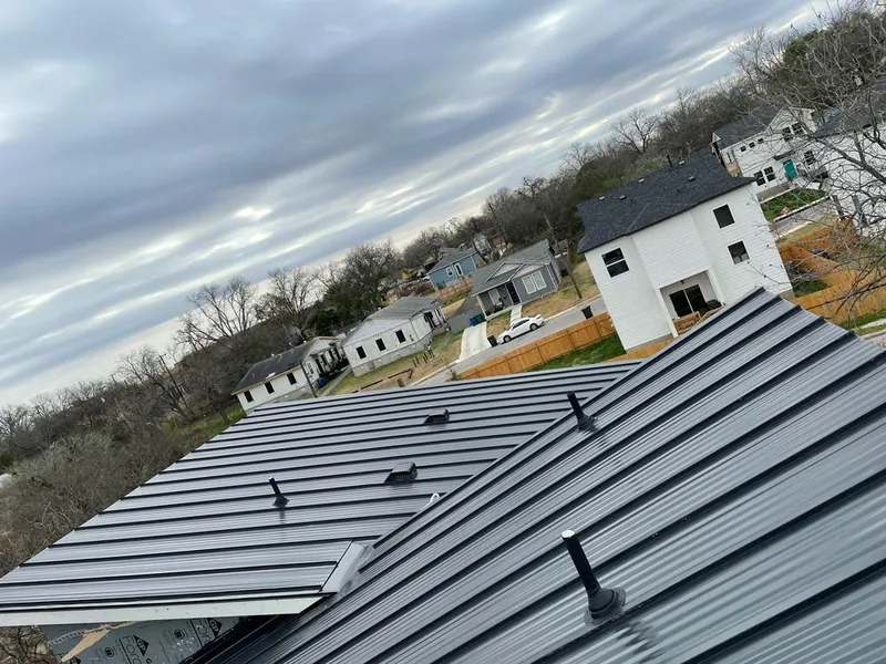 Standing seam metal roof panels with vents for Skylight Repair in Steamboat Springs